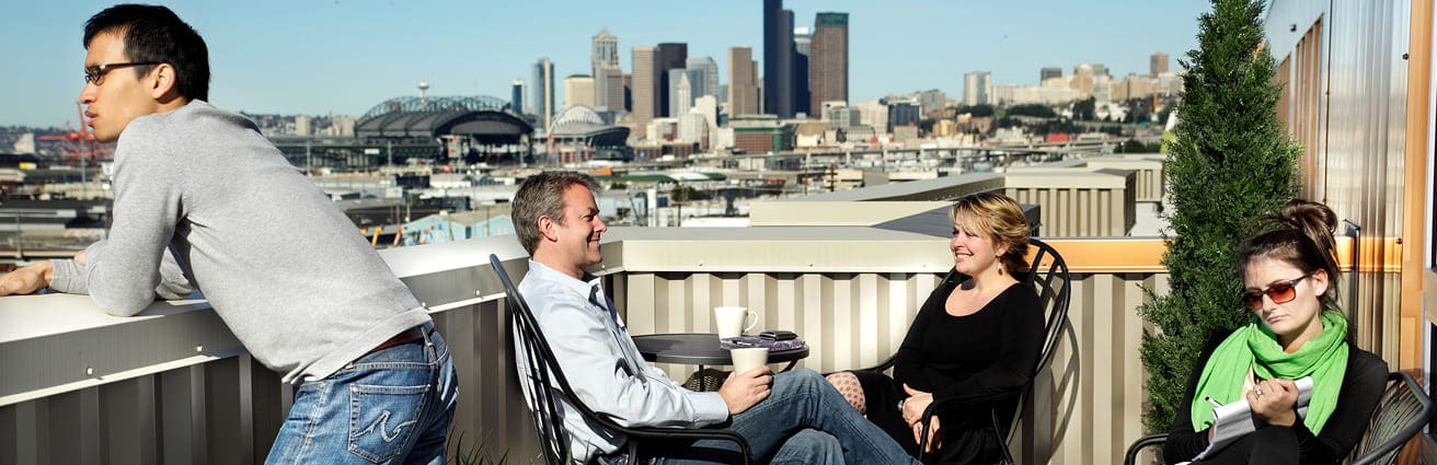 tenants relaxing on building terrace